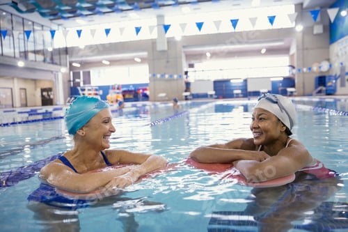 Preview: Women Talking In Swimming Pool