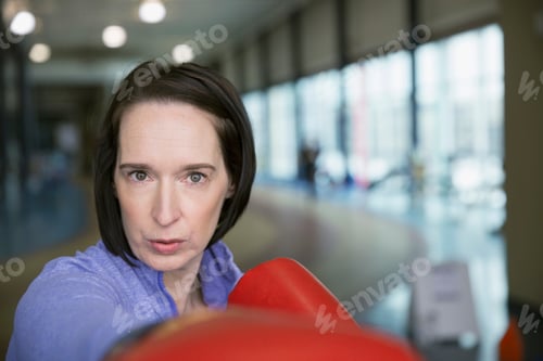 Preview: Close Up Portrait Of Serious Woman Boxing