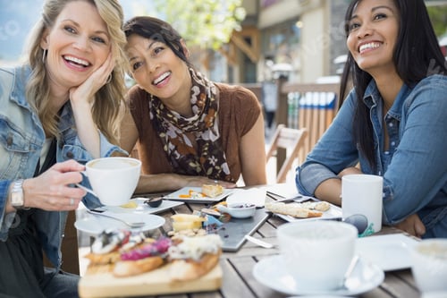 Preview: Women Eating Together In Cafe