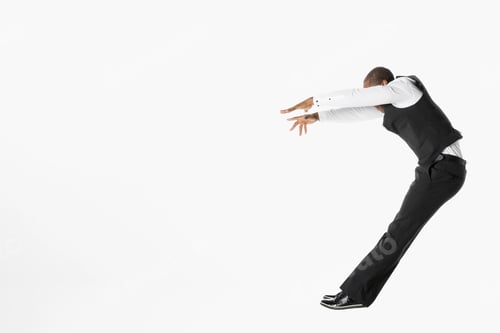 Preview: Businessman Jumping, Falling Back Against White Background