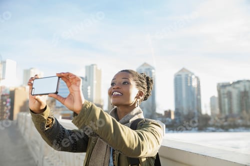 Preview: Woman Photographing With Smart Phone Outdoors