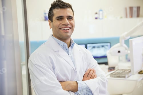 Preview: Dentist Laughing In Doorway Of Office