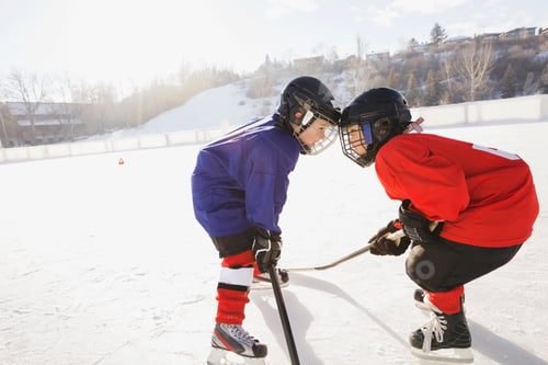 Preview: Hockey Players Facing Off On Ice Rink