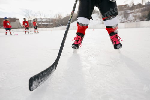 Preview: Low Section Of Ice Hockey Player On Rink
