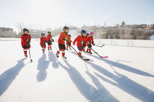 Preview: Ice Hockey Team Skating On Outdoor Rink