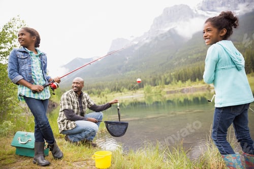 Preview: Father And Daughters Fishing At Lakeside
