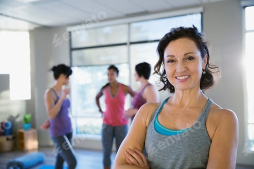 Preview: Portrait Of Smiling Woman In Yoga Classroom
