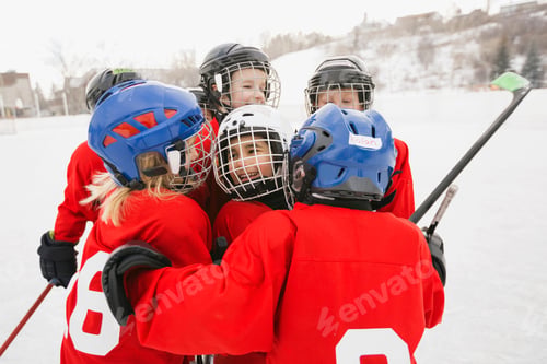 Preview: Happy Ice Hockey Players Embracing Each Other On Rink