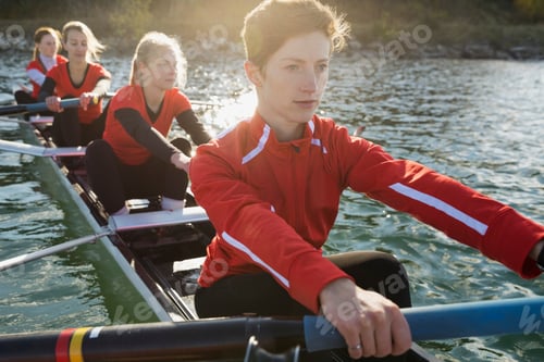 Preview: Rowing Team In Scull On River
