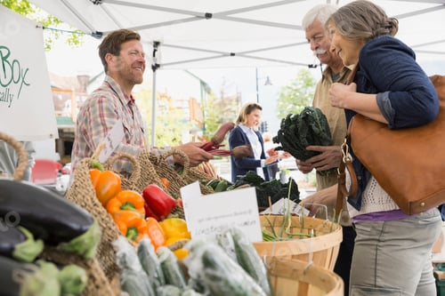 Preview: Older Couple Shopping At Farmers Market