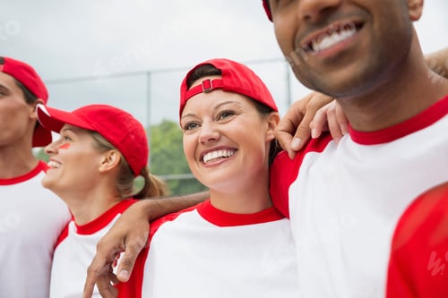Preview: Baseball Team Laughing Together In Field