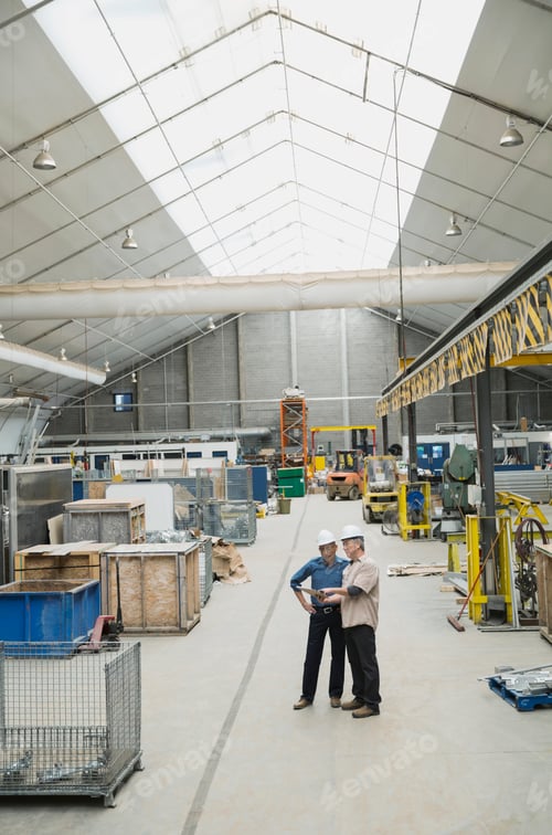 Preview: Workers Meeting In Manufacturing Plant