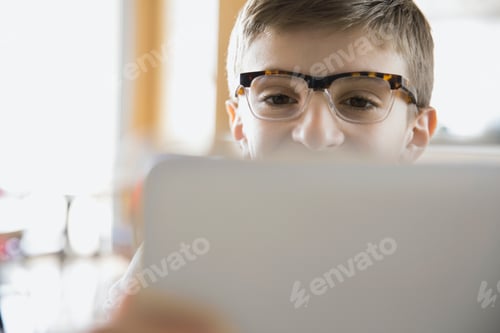 Preview: Close Up Of School Boy Using Laptop In Classroom