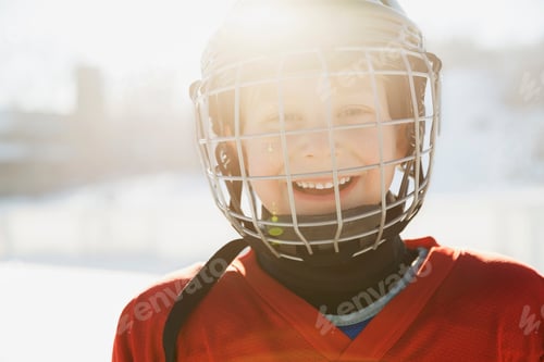 Preview: Portrait Of Smiling Boy In Ice Hockey Helmet