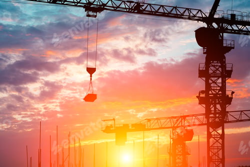 Preview: Crane And Building Construction Site At Sunset