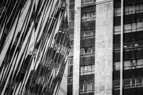 Preview: Bottom Up View Of Modern Office Building In Hong Kong In B&W Color