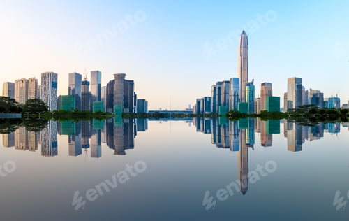 Preview: Beautiful Modern City Skyline And Water Reflection In Shenzhen At Sunrise
