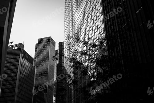 Preview: Bottom Up View Of Modern Office Building In Hong Kong With B&W Color