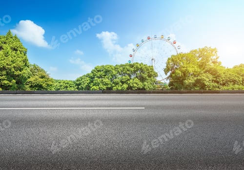 Preview: Asphalt Road And Forest With Playground Ferris Wheel