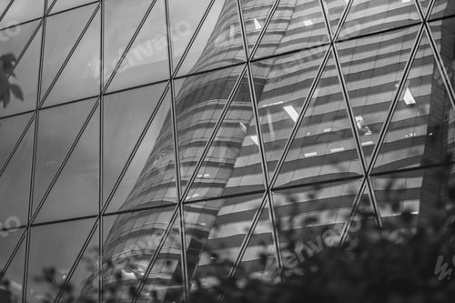 Preview: Bottom Up View Of Modern Office Building In Hong Kong With B&W Color