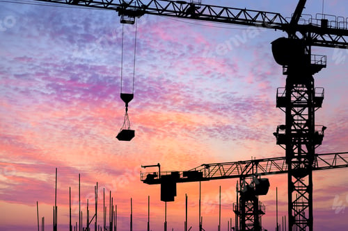 Preview: Crane And Building Construction Site At Sunset