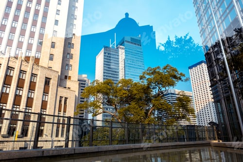 Preview: Bottom Up View Of Modern Office Building In Hong Kong