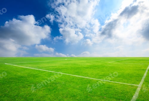 Preview: Green Football Field Under Blue Sky Background