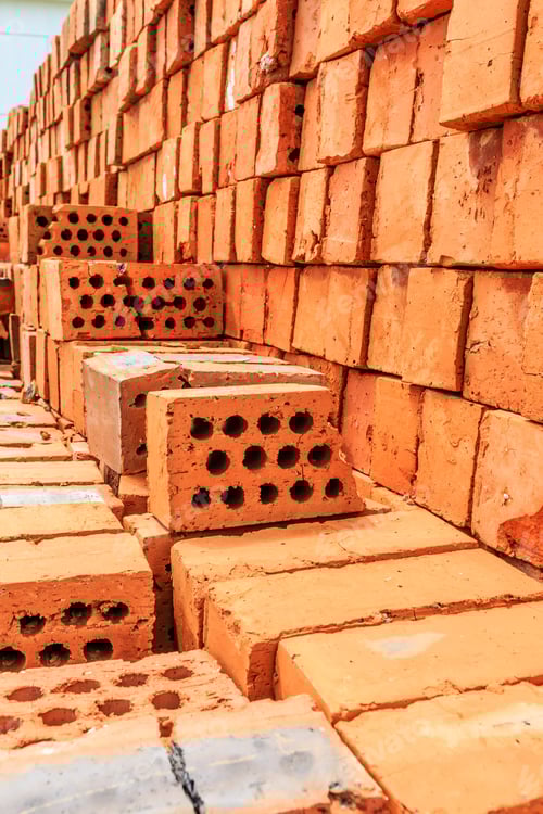 Visualização: Textura de fundo de parede de tijolo amarelo.