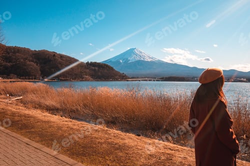 Preview: Beautiful Girl With Copy Space. Vintage Tone On View Of Mountain Fuji At Lake Kawaguchiko Before