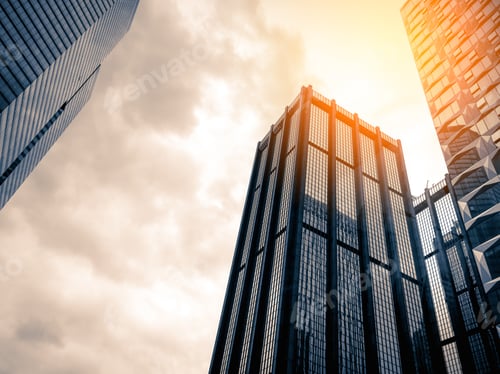 Preview: Bottom Up View Of Modern Office Building In Hong Kong With Sunlight