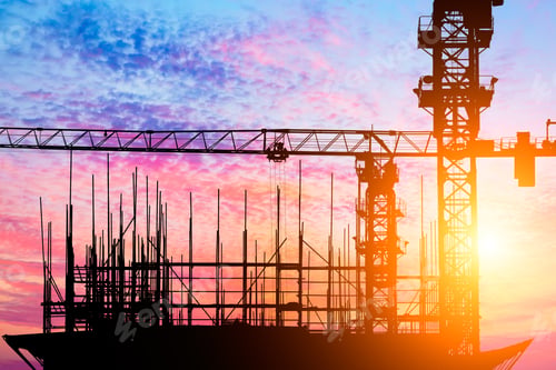 Preview: Crane And Building Construction Site At Sunset