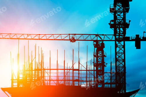 Preview: Crane And Building Construction Site At Sunset