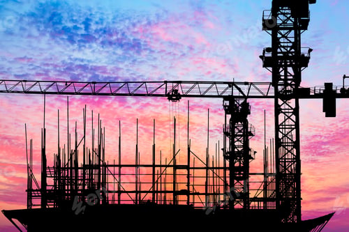 Preview: Crane And Building Construction Site At Sunset