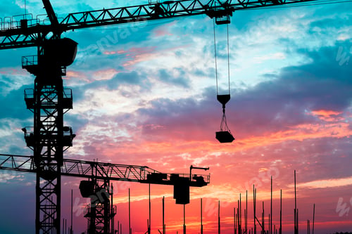 Preview: Crane And Building Construction Site At Sunset