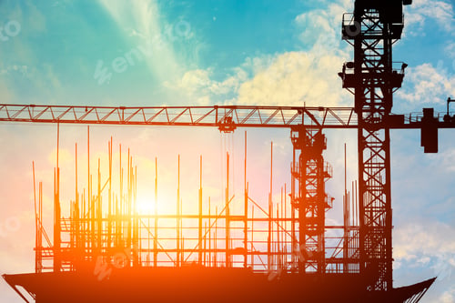 Preview: Crane And Building Construction Site At Sunset
