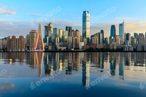 Preview: Chongqing Skyline And Modern Urban Skyscrapers With Water Reflection At Sunset,China.
