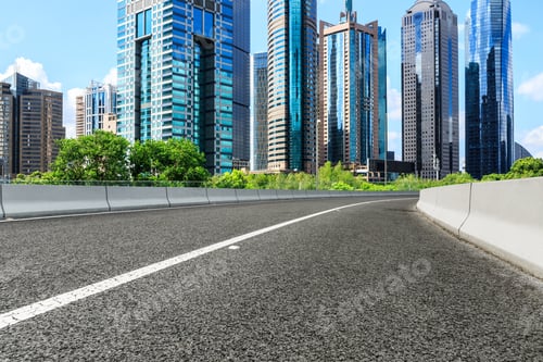 Preview: Asphalt Road And Modern City Commercial Buildings In Shanghai,China