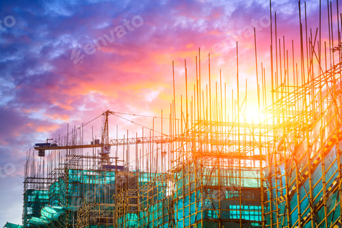 Preview: Tower Crane And Building Construction Site Silhouette At Sunrise.