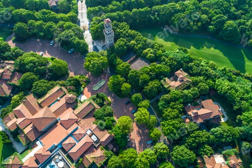Preview: Aerial View Of A Beautiful Green Golf Course With Residential Architecture.