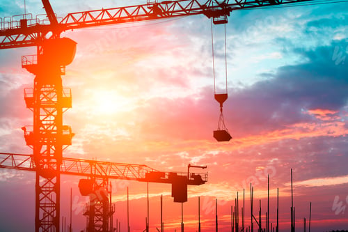 Preview: Crane And Building Construction Site At Sunset