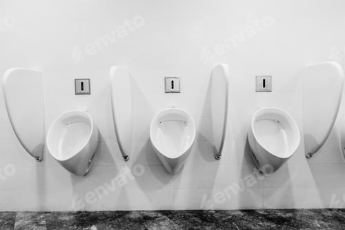 Preview: Modern Restroom Interior With Urinal Row