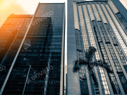 Preview: Bottom Up View Of Modern Office Building In Hong Kong With Sunlight