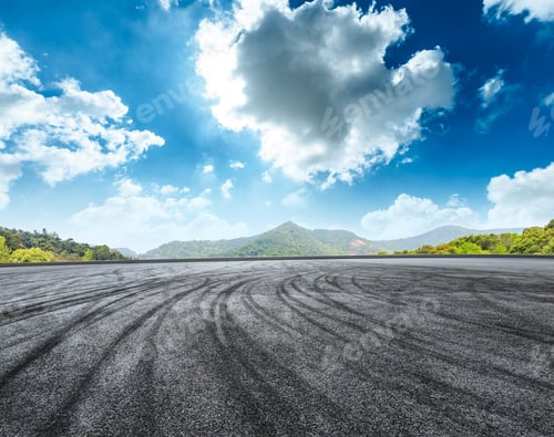 Preview: Circuit Asphalt Road And Green Mountain Nature Landscape Under The Blue Sky