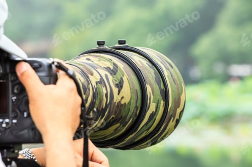 Preview: Photographer Taking Photo In Outdoor Park