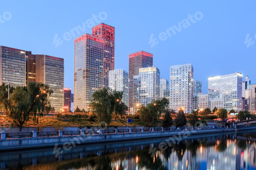 Preview: Business District Office Buildings And Water Reflection In Beijing At Night