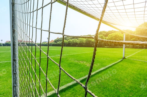 Preview: Green Football Field Under Blue Sky Background