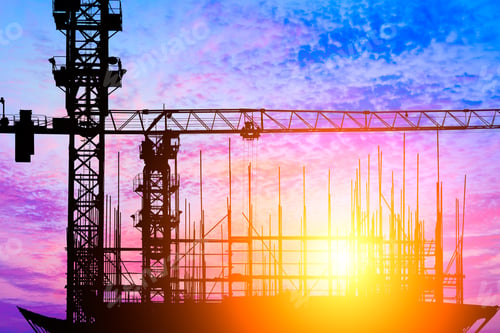 Preview: Crane And Building Construction Site At Sunset
