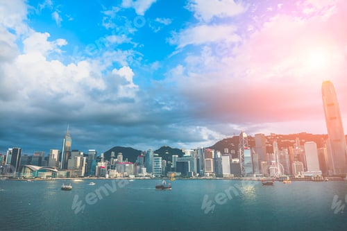 Aperçu: Panorama Of Hong Kong City Skyline From Across Victoria Harbor; With Sunlight Effect
