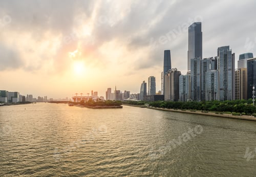 Preview: Guangzhou,China Modern City Skyline Panorama On The Zhujiang River At Sunset