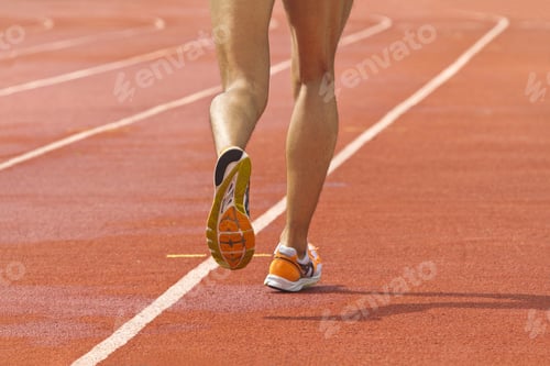 Preview: Male Running At A Track And Field Stadium